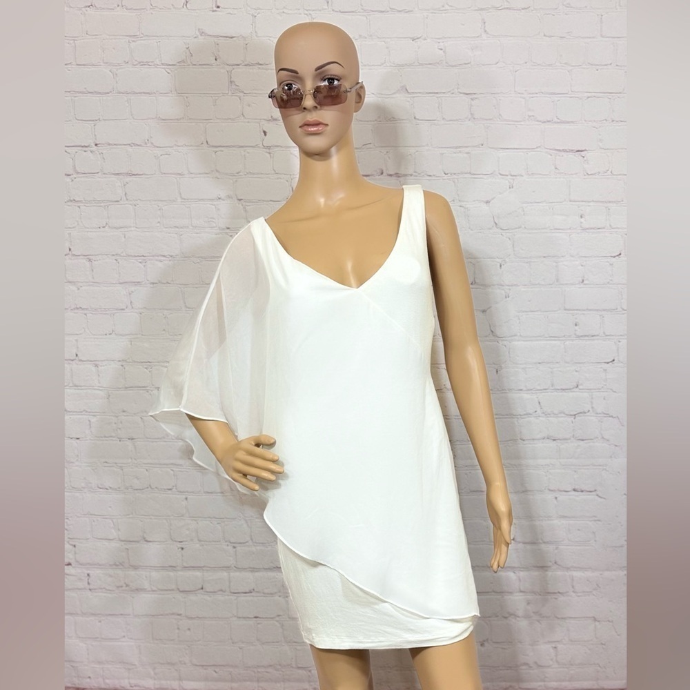BEBE Y2K women’s white body con dress with 1 butterfly sleeve in size Small GUC